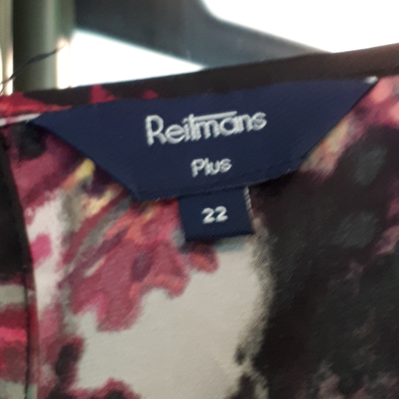 Reitman's Peplum Top - Picture 2 of 3